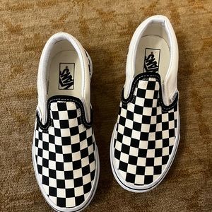 Vans size 1 slip ones.